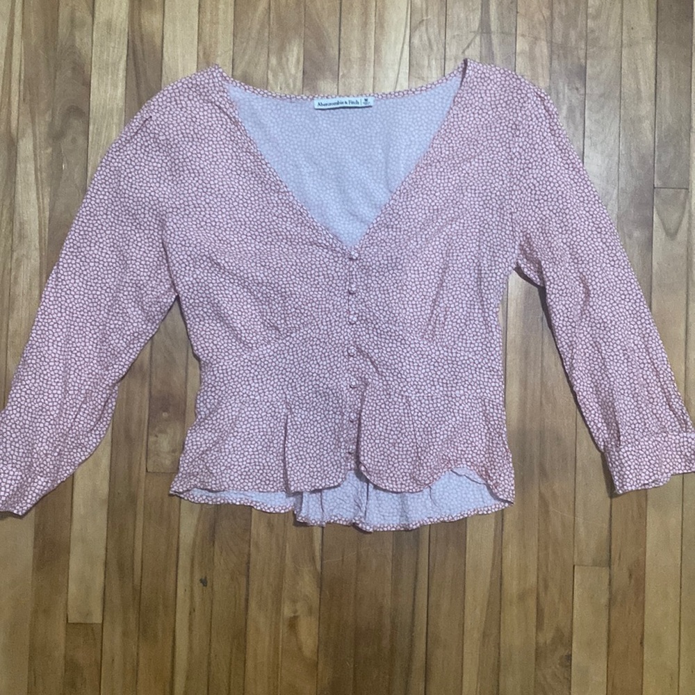 Gently used pink and white floral blouse!
